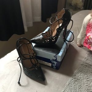 Black heels with red bottoms with box
